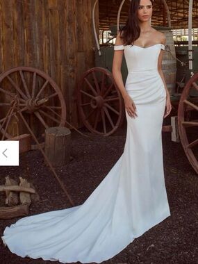Elegant Off-Shoulder White Bridal Gown with Long Train